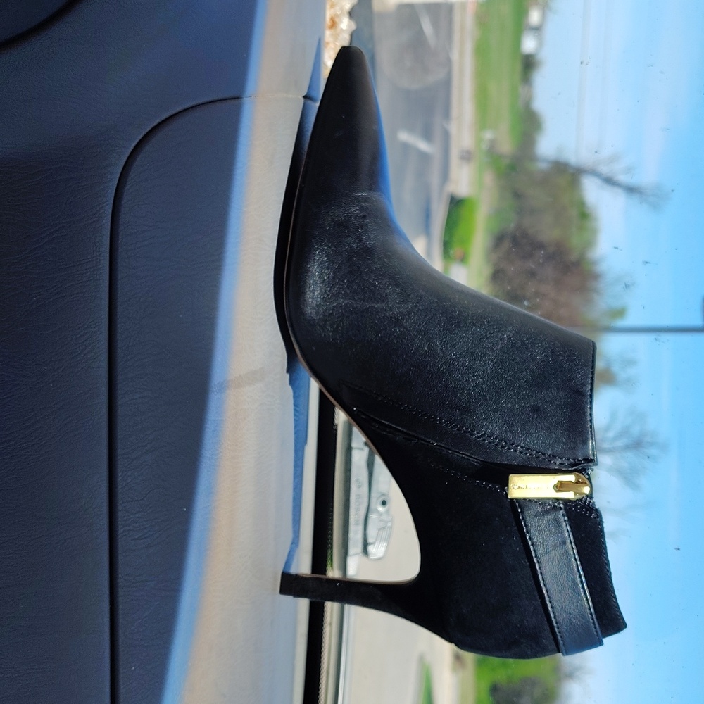 Vince Camuto Women's Black Pointed Ankle Bootie with Gold Zip Detail